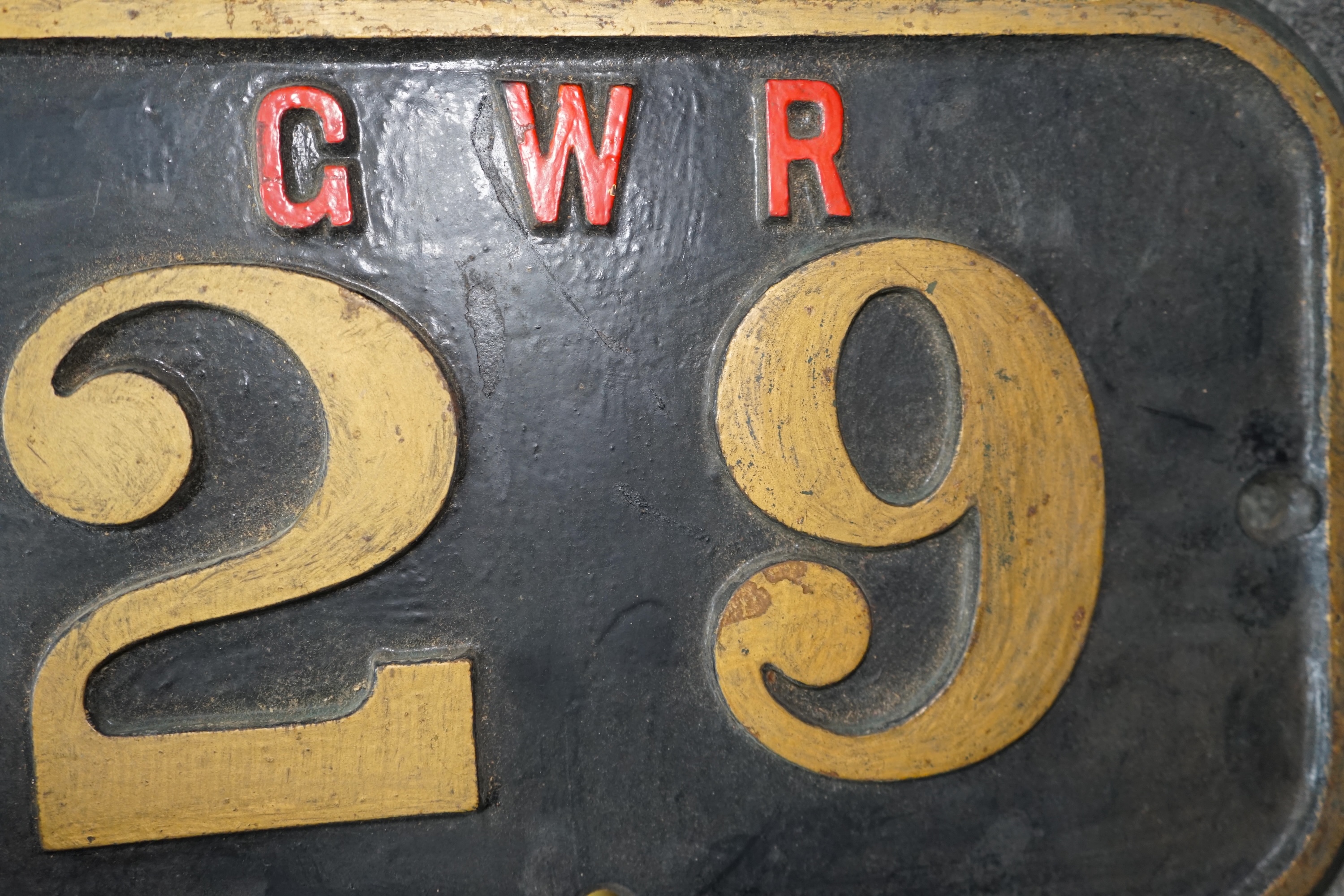 A cast iron GWR locomotive cab side number plate for an 0-6-0ST locomotive, 29, later converted to a pannier tank in the 1920s and used by the Hafod Colliery Railway, dimensions; 46.5cm x 29.5cm. Condition - fair to good
